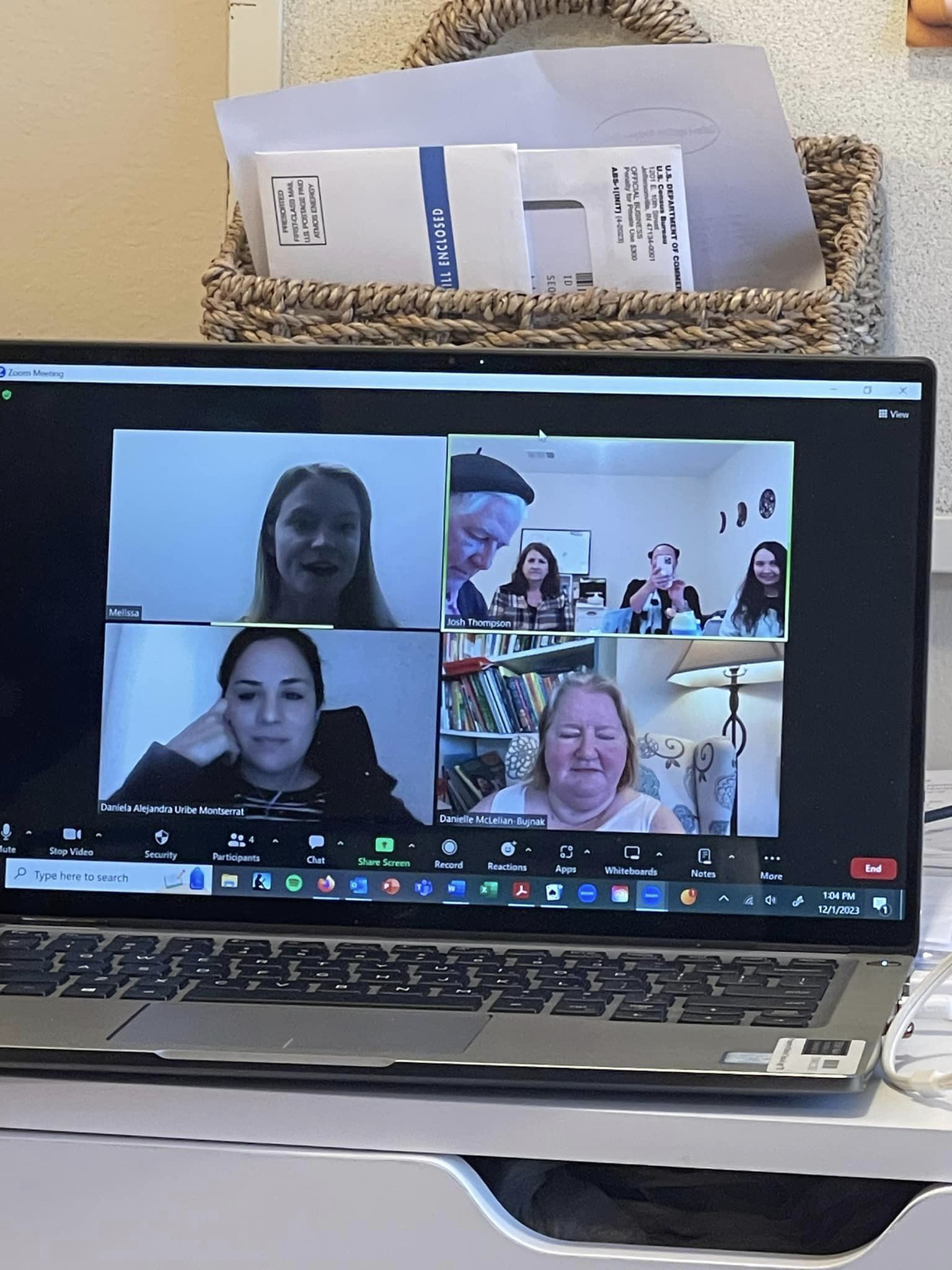 photo of a computer zoom screen with 7 people